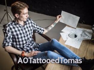 A0TattooedTomas